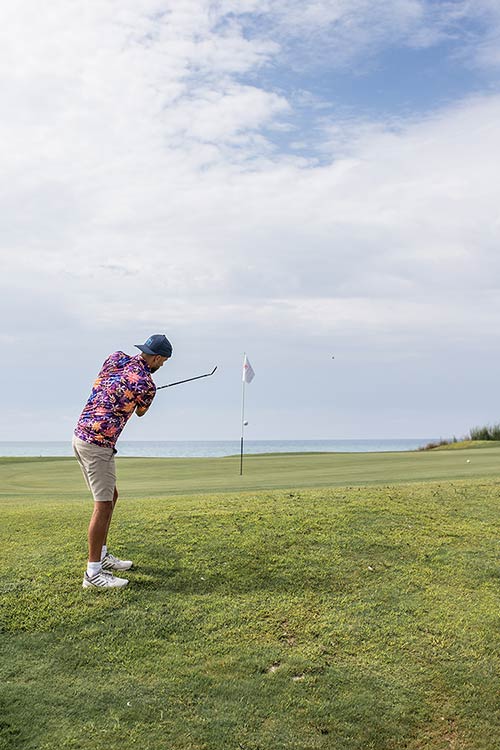 The groom spent the morning on the resort's magnificent golf greens